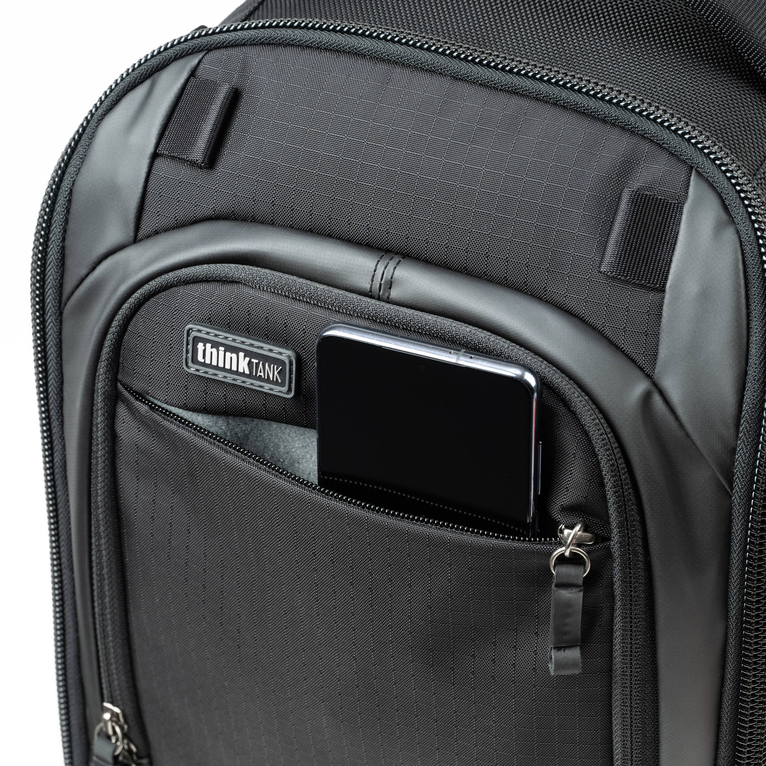 Think Tank Walker Pro Series backpack for video equipment, black camera and gear bag with multiple compartments and padded straps.
