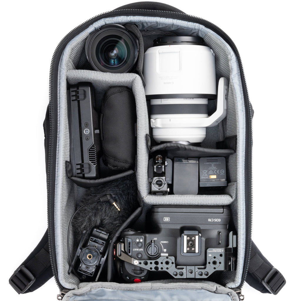 Think Tank Walker Pro Series backpack for video equipment, black camera gear bag with multiple compartments and padded straps.