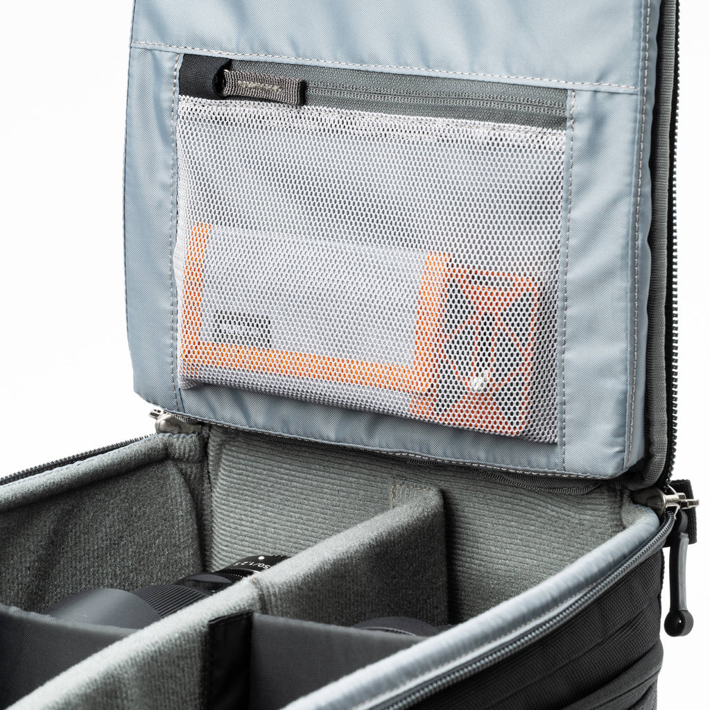 Think Tank Walker Pro Series backpack for video equipment, black camera and gear bag with multiple compartments and padded straps.