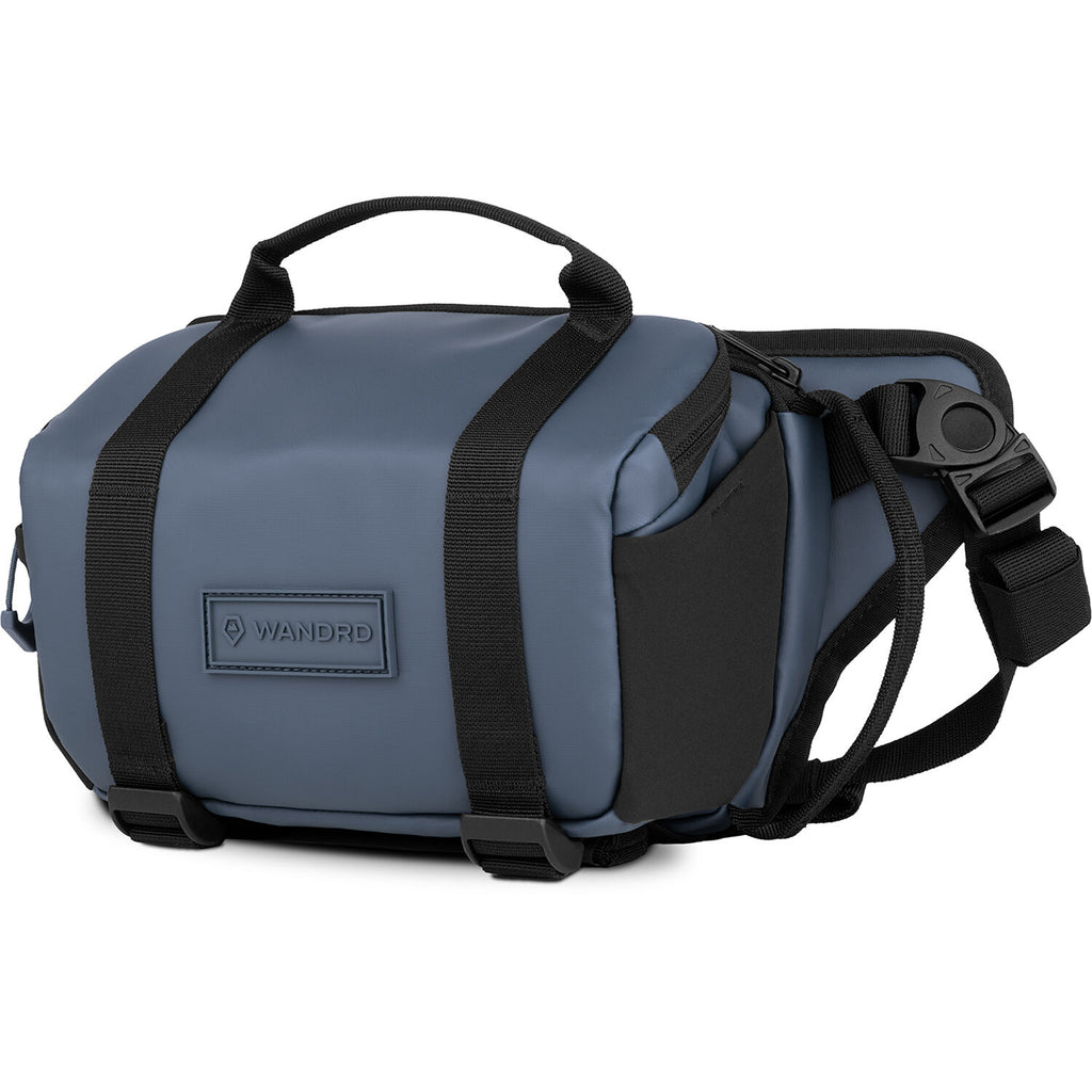 Wandrd Rogue Sling video equipment bag with adjustable strap and multiple compartments for camera gear and accessories.