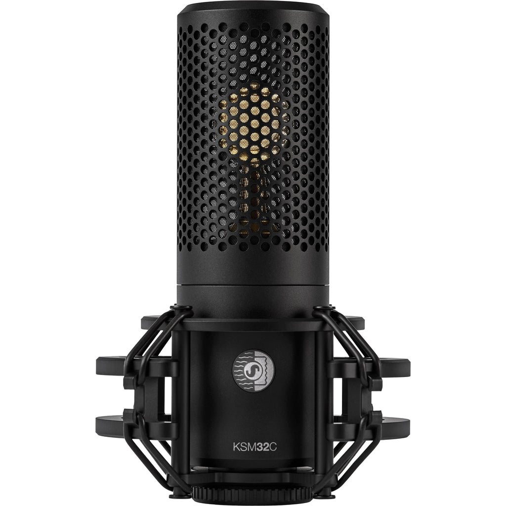 Shure KSM32C/SM studio condenser microphone with shock mount and accessories, designed for professional recording and studio use.