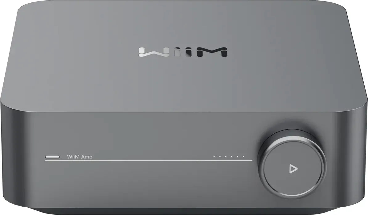 WiiM AMP music streamer device with sleek black design, compact form, and various ports for high-quality audio streaming.
