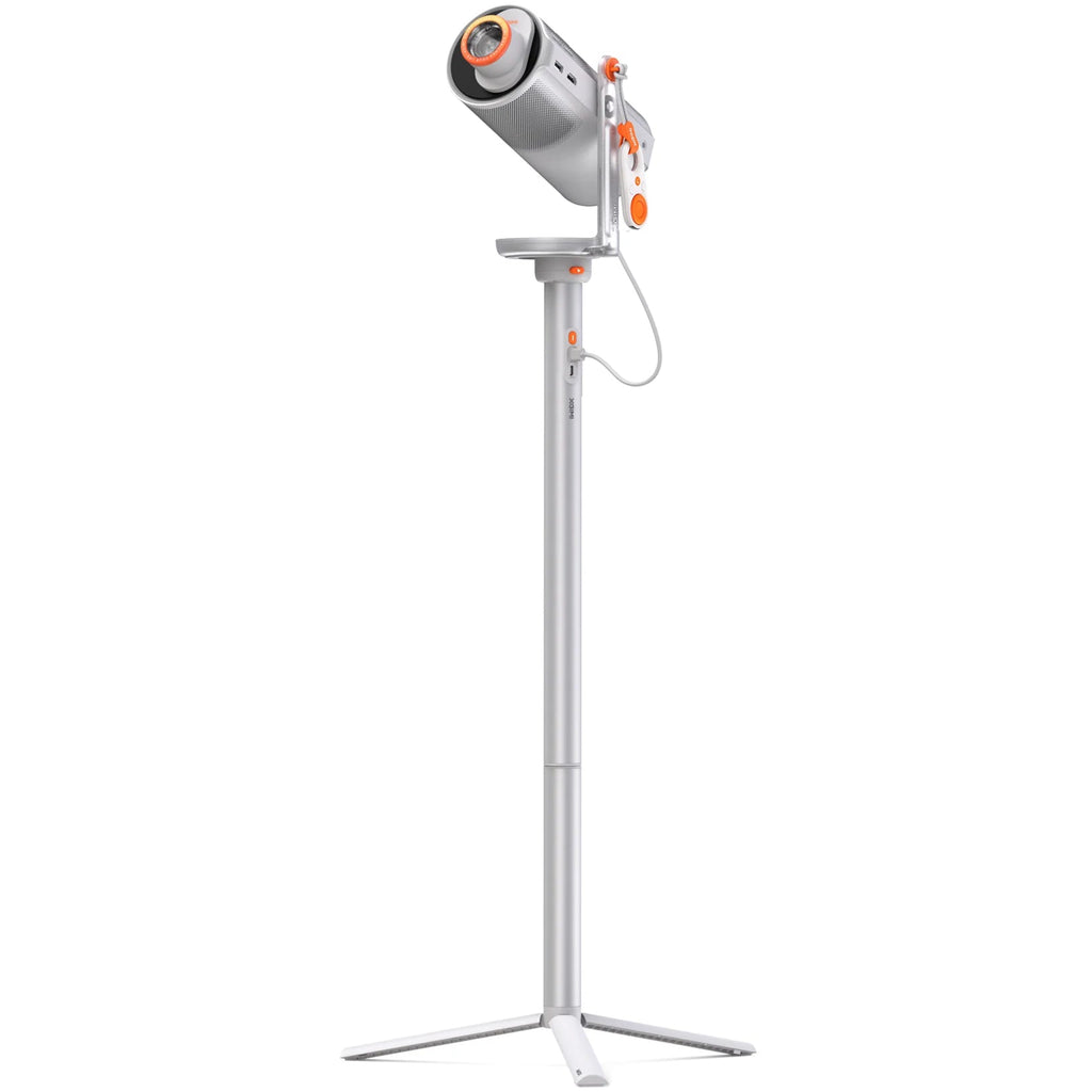 Xgimi Mogo 4 portable projector displaying colorful images on a wall, compact design with lens and control buttons visible.