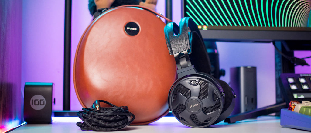 FiiO FT3 wired headphones with 350Ω impedance, black over-ear design, and detailed ear cups for high-quality audio.