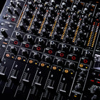 Pioneer DJ DJM-V10-LF mixer with 4-band EQ and compressor, showing detailed control knobs and audio interface.