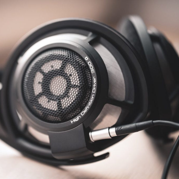 Sennheiser HD 800 S high-fidelity over-ear headphones with large ear cups and sleek black design, showcasing premium audio quality.