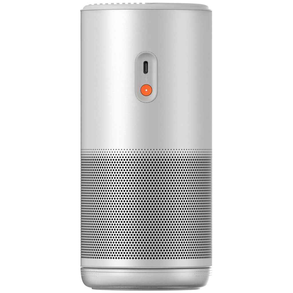 Xgimi Mogo 4 portable projector showing a colorful image projected on a wall with a sleek design and built-in lens.