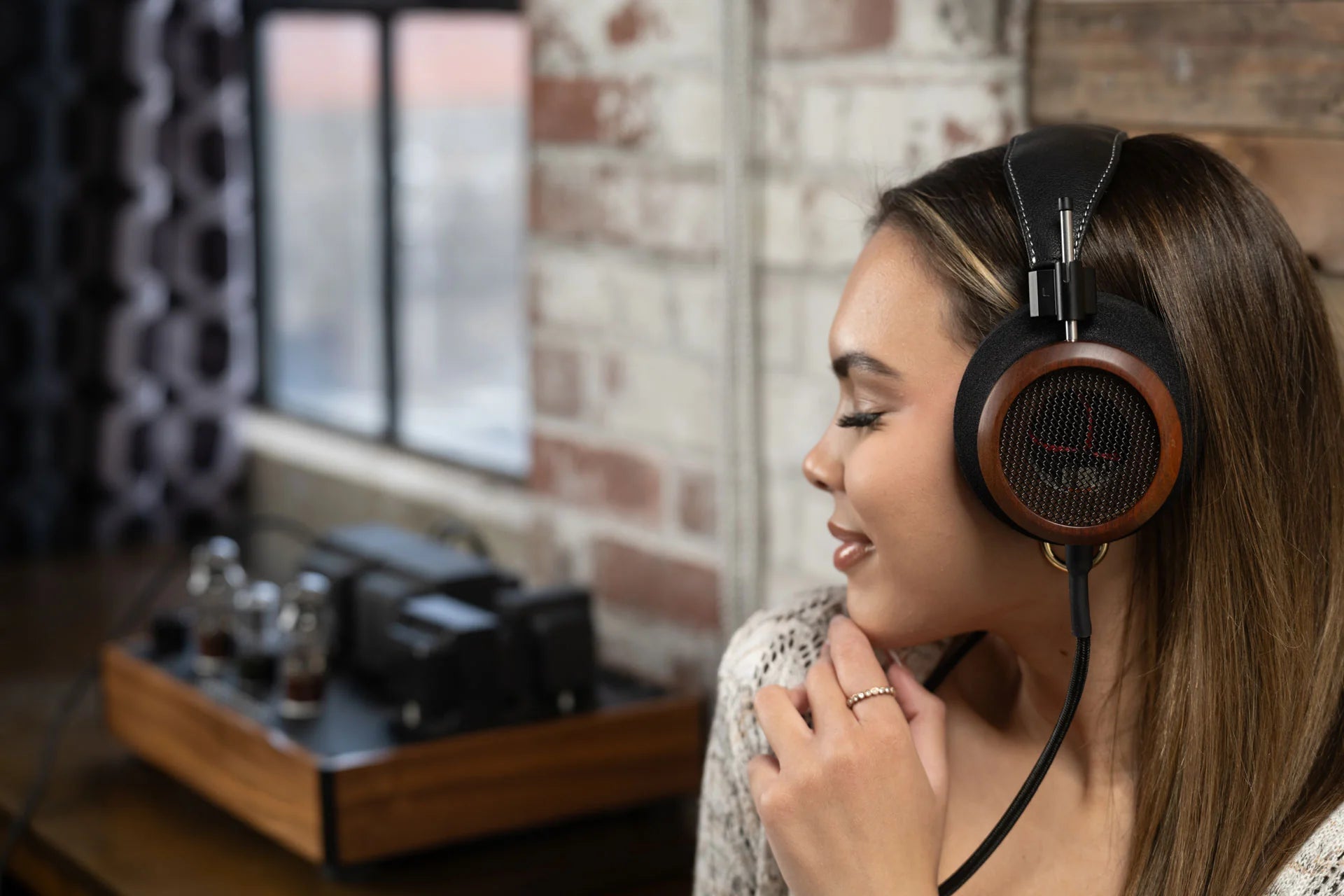Grado Signature S950 wired headphones with wooden ear cups and classic design, showcasing premium audio quality and craftsmanship.