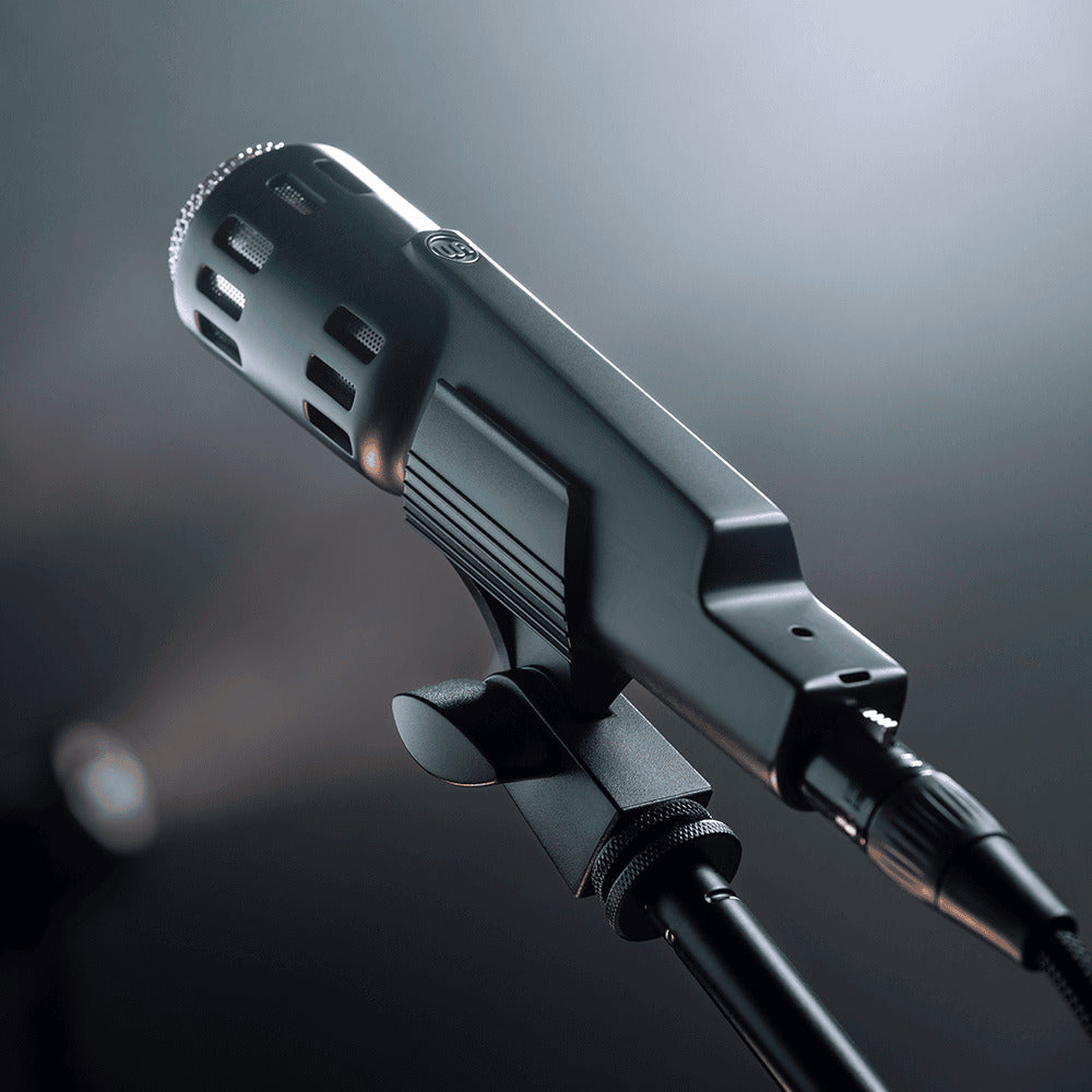 Warm Audio Retro 64 dynamic microphone in matte black finish, featuring vintage design and sturdy build for professional audio recording.