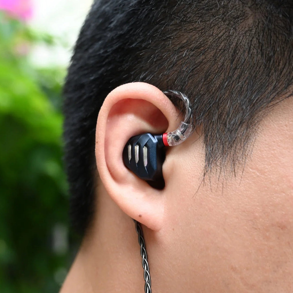 FiiO FH7S in-ear headphones with black design, detailed earpieces and cable, showcasing high-quality audio accessories.