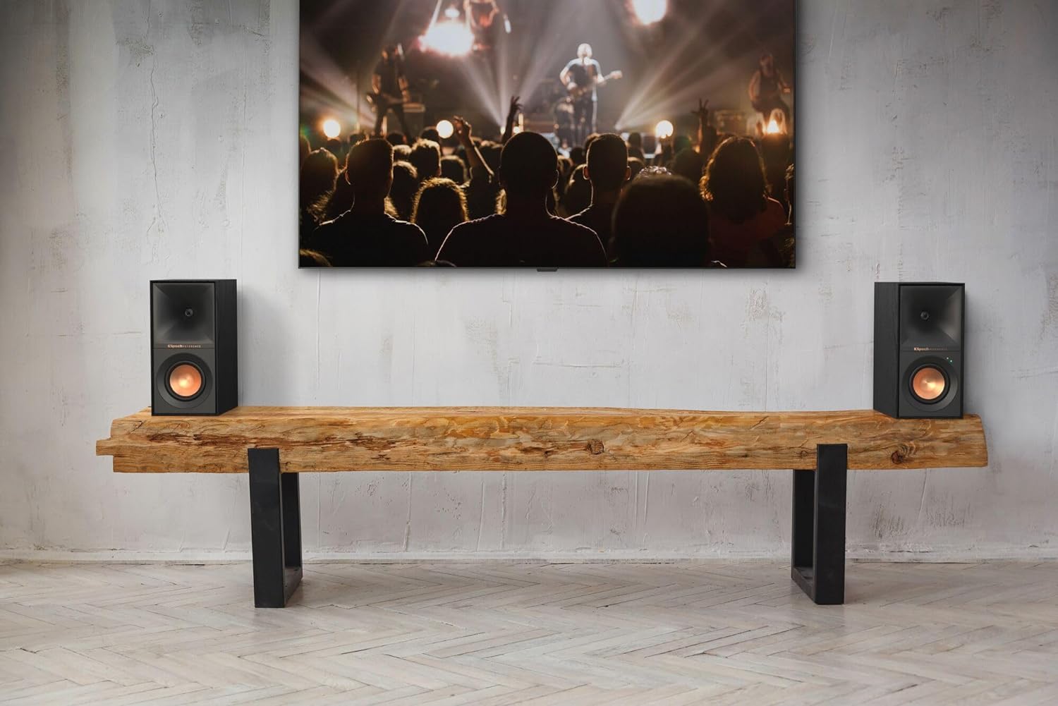 Black Klipsch R-40PM wireless speakers with sleek design, shown in a close-up image highlighting the speaker grille and branding.