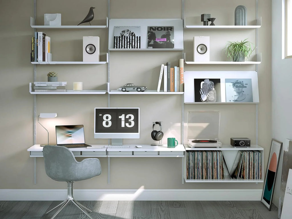 KEF Q3 Meta passive bookshelf speakers with black cabinets and sleek design, ideal for high-quality home audio setup.