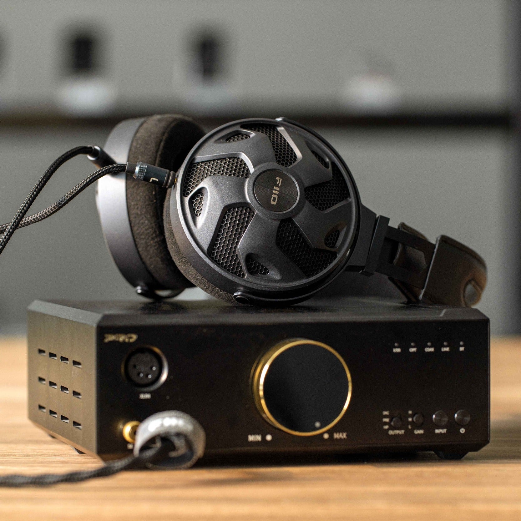 FiiO FT3 wired headphones with 350Ω impedance, featuring over-ear design and black finish, visible ear cups and cable.
