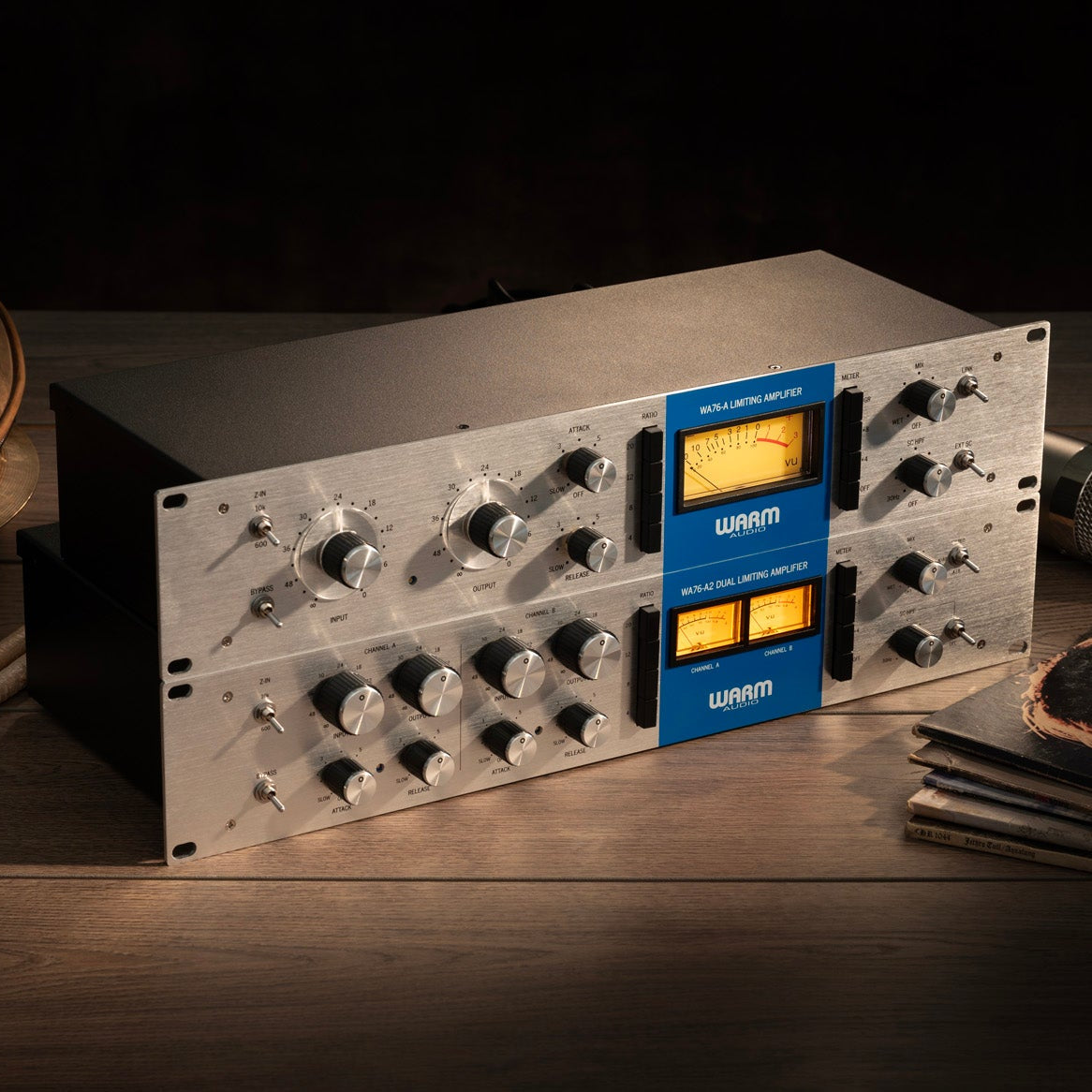 Warm Audio WA76-A2 effects and accessories image showing a vintage-style compressor with blue-striped design and control knobs.