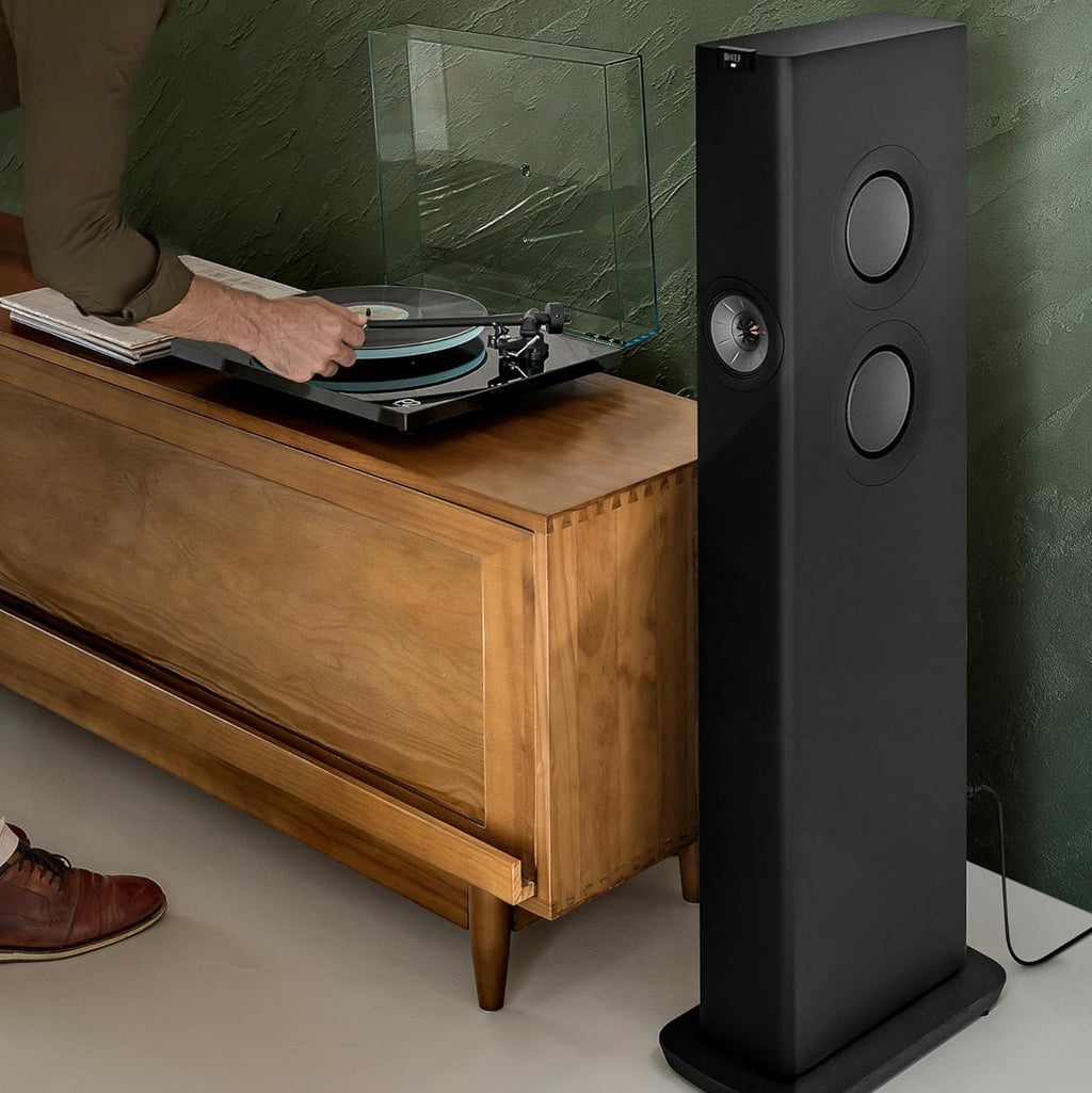 KEF LS60 Wireless floorstanding speakers with sleek black finish and modern design, showcasing their slim profile and premium build.
