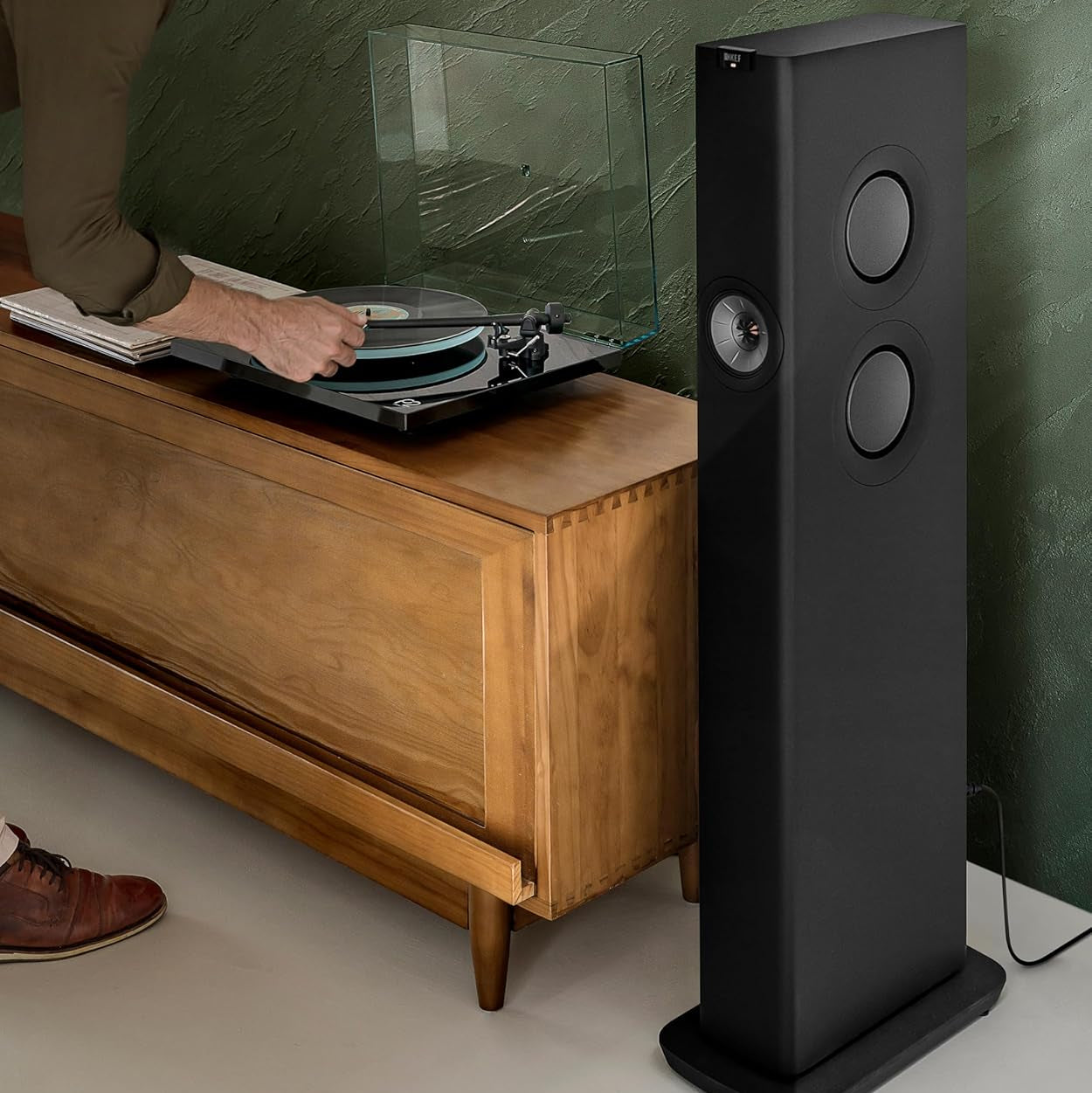 KEF LS60 Wireless floorstanding speakers with sleek black finish and modern design, showcasing their slim profile and premium build.