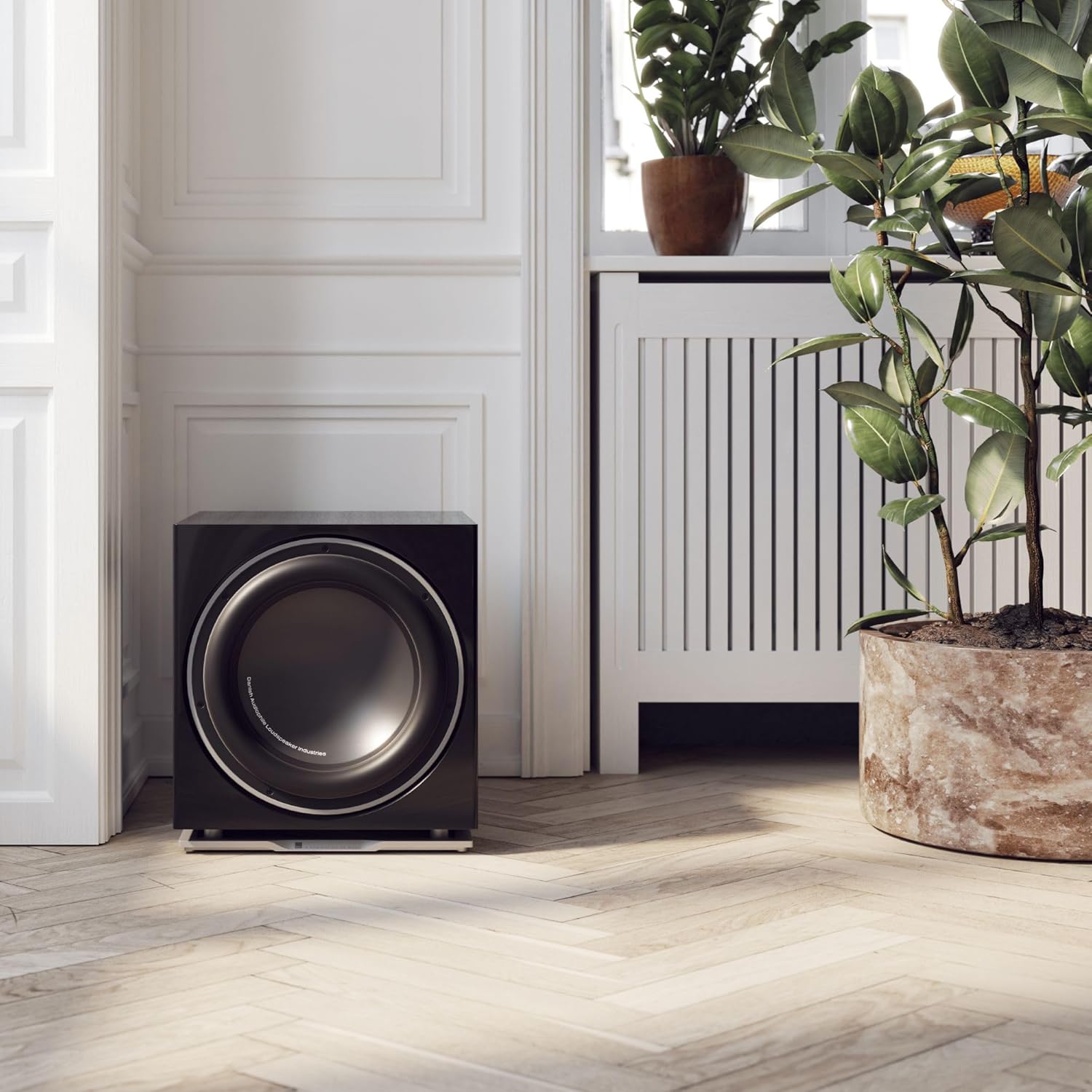 DALI Dali Sub E-9 F subwoofer with black cabinet, front view showing speaker grille and control panel