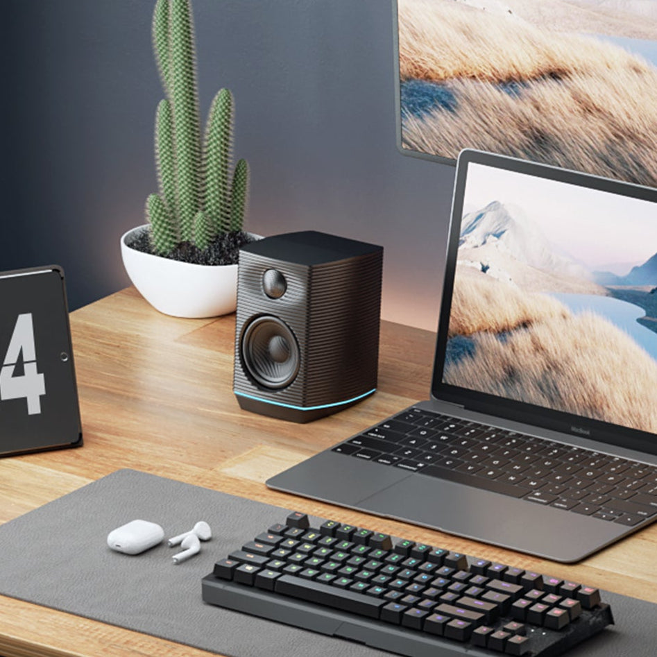 FiiO SP3 BT desktop speakers with compact design, black finish, and audio input ports for high-quality sound.