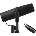 Shure SM7B dynamic microphone with MVX2U XLR-to-USB adapter connected, suitable for professional audio recording and broadcasting.