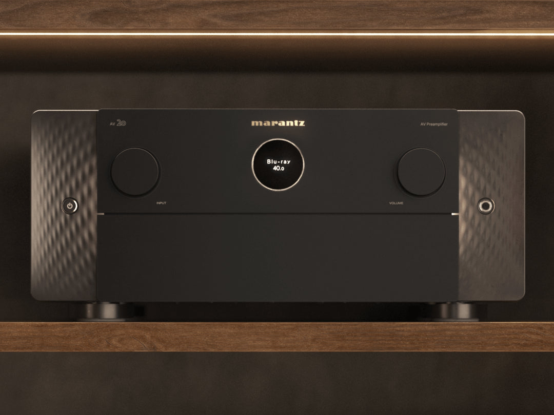 Marantz AV 20 stereo amplifier with sleek design and control knobs, showcasing high-quality audio equipment for home audio systems.