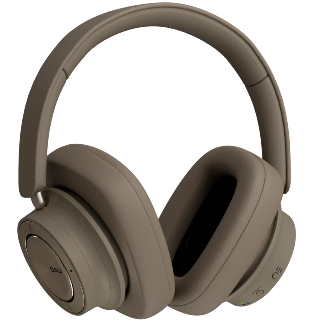 DALI iO-12 wireless headphones in mocha grey with cushioned ear cups and sleek design, resting on a white background.