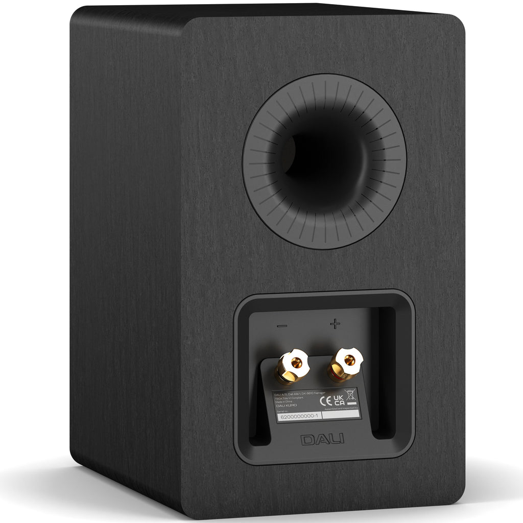 DALI Kupid passive bookshelf speakers with black ash finish and grill covering, compact and stylish for home audio.