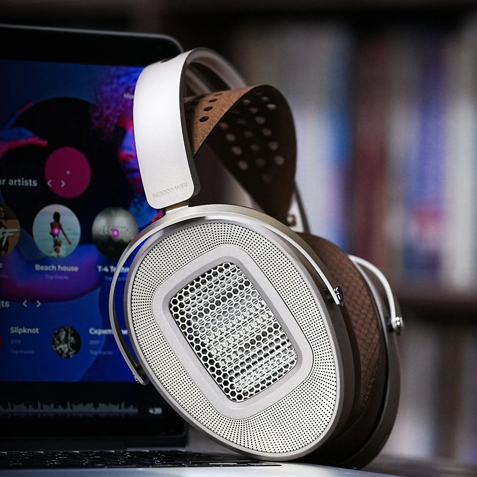 HiFiMAN HE1000 WiFi wireless headphones with sleek design and over-ear ear cups, showcasing premium audio quality.