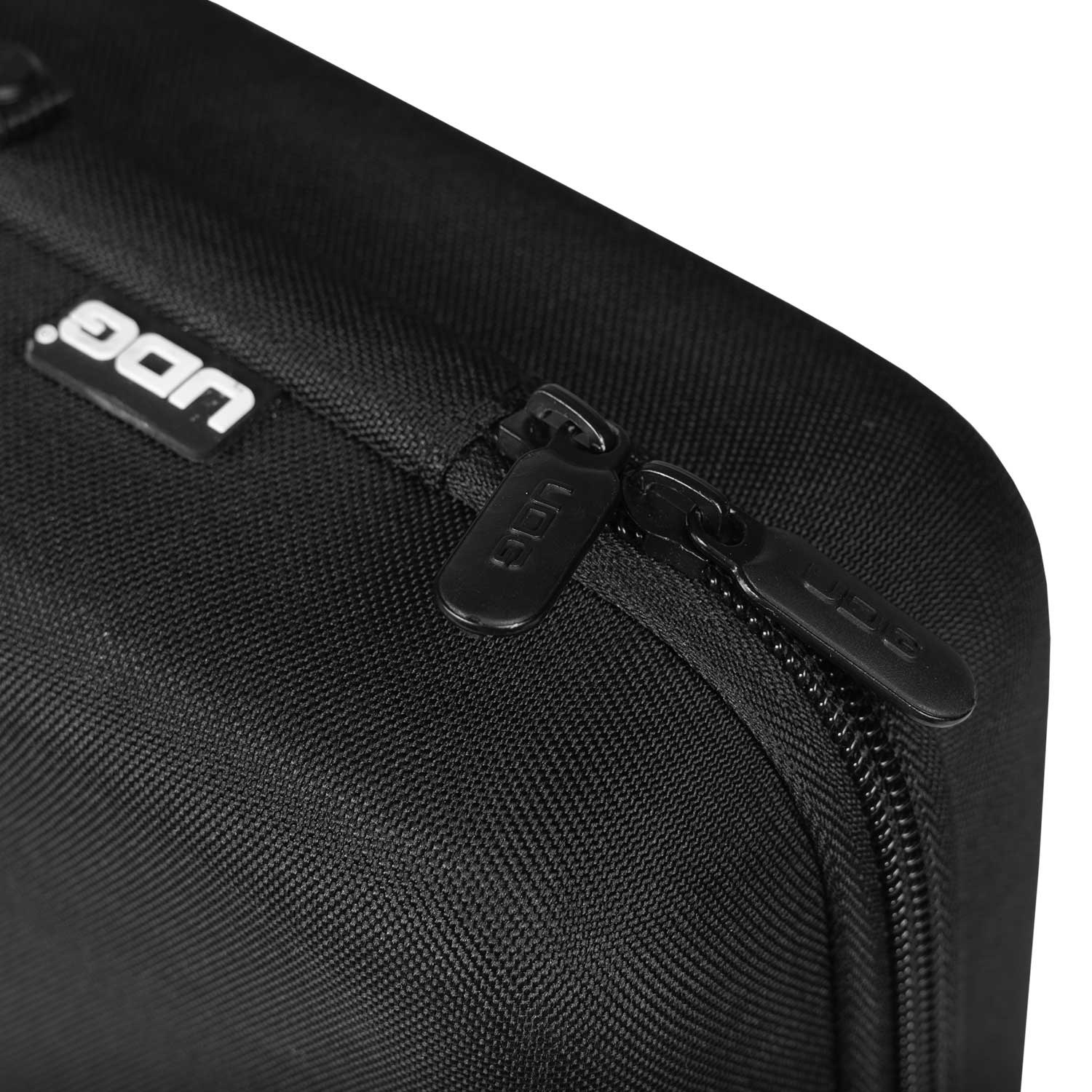 UDG Creator AlphaTheta DDJ-FLX2 black DJ hardcase with zipper closure, designed for secure transport of DJ equipment.