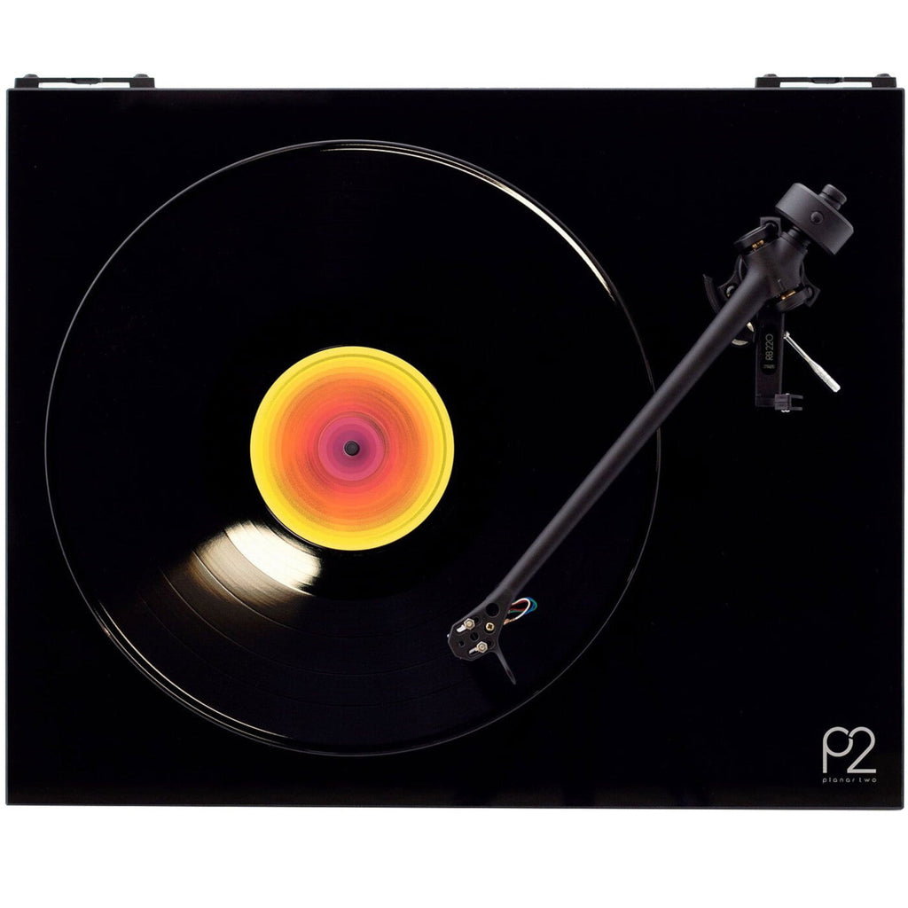 Rega Planar 2 turntable with Nd3 cartridge, featuring a sleek design and tonearm, on a wooden stand.