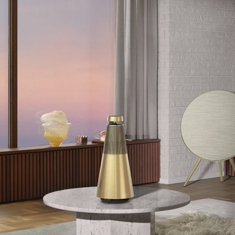 Wireless Bang & Olufsen Beosound 2 3rd Gen speaker in a stylish living room setting.
