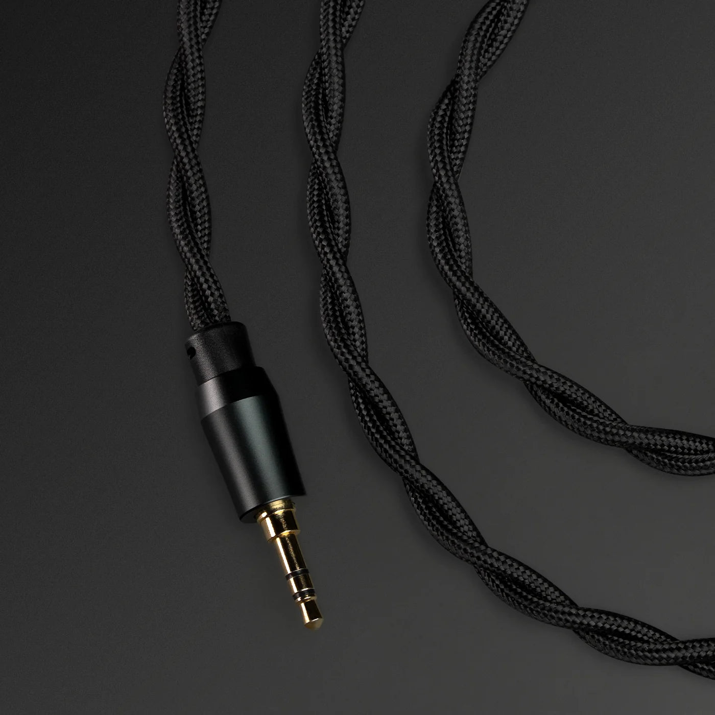 Meze Audio 99 Classics 2nd Gen wired headphones with wooden ear cups and metal accents, showing the input socket.