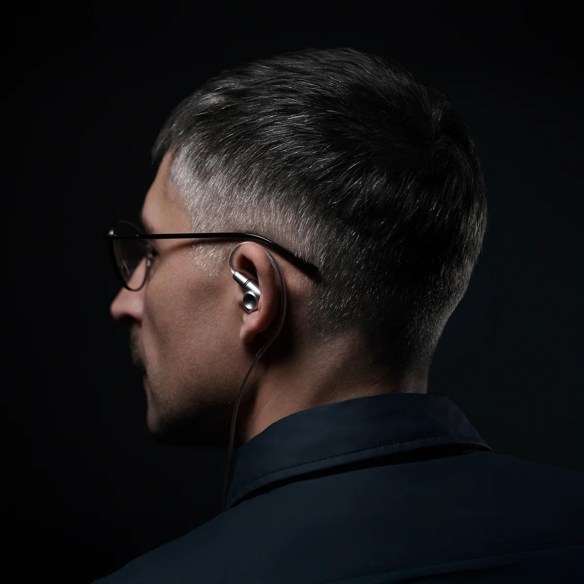 Meze Audio Astru wired in-ear headphones with sleek black design and in-ear monitors for high-quality sound.