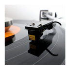 Nagaoka JN-P700 stylus for turntable record player, shown with its sleek design and cartridge tip on a stereo audio setup.