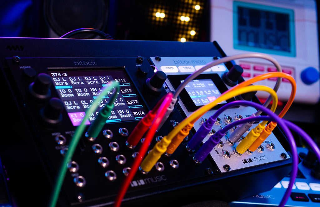 Semi-modular synthesizer 1010music Bitbox MK2 with colorful knobs and interface, designed for music production and sound design.