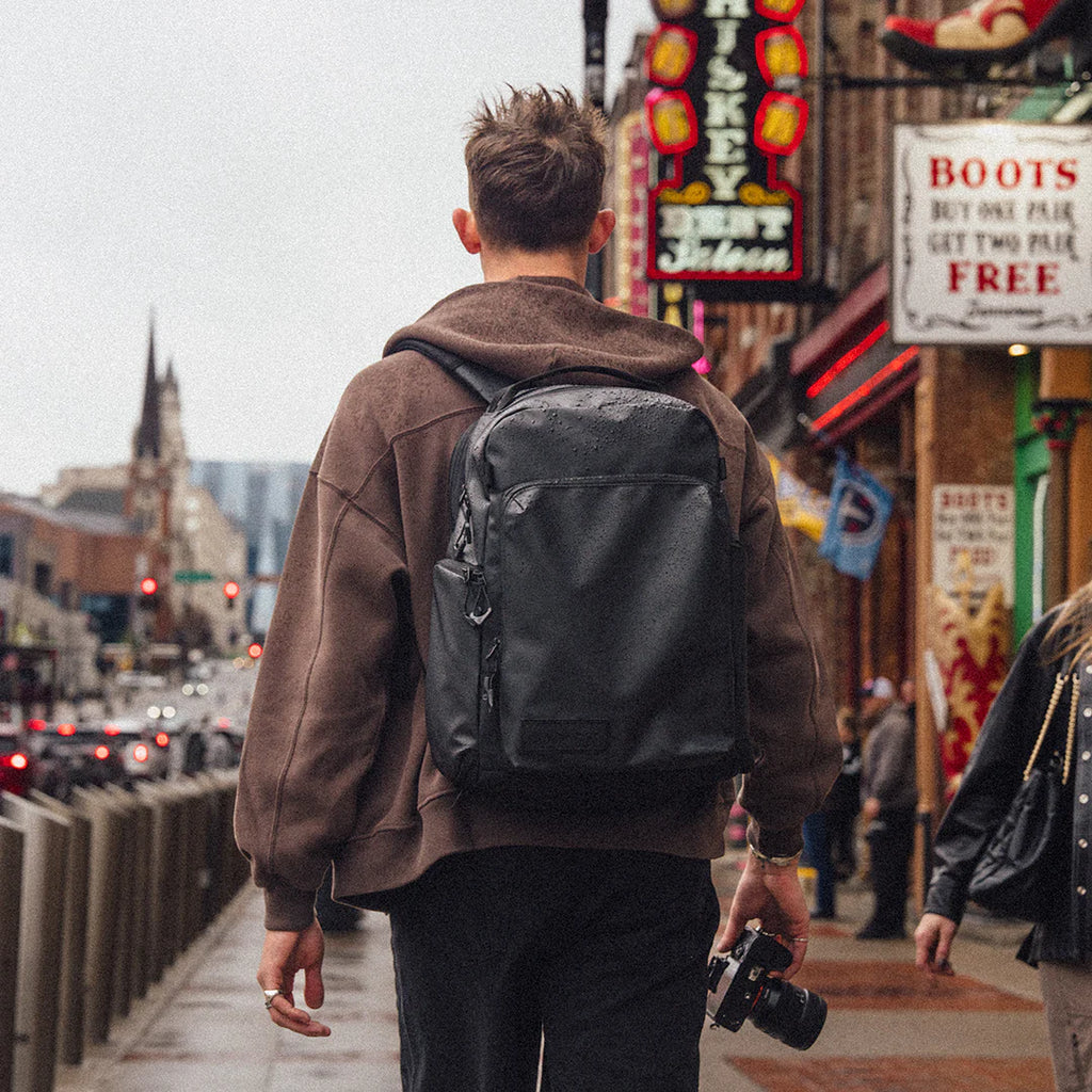 Black Wandrd PRVKE Pocket video equipment bag with compact design and adjustable strap, suitable for storing cameras and accessories.