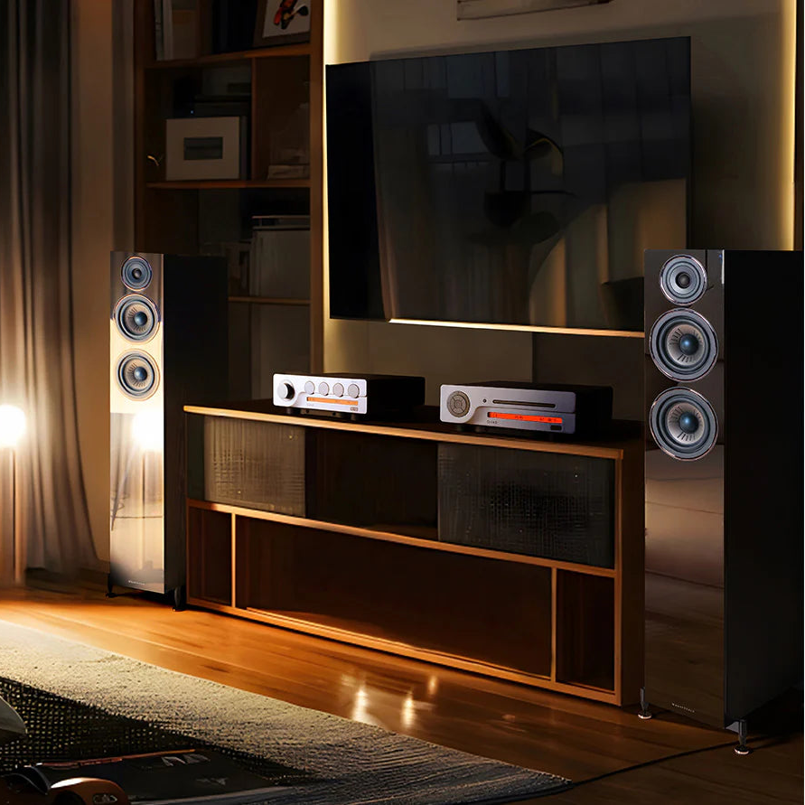 Quad 3CDT CD player with sleek black design, featuring multiple disc slots and digital controls for high-quality audio playback.