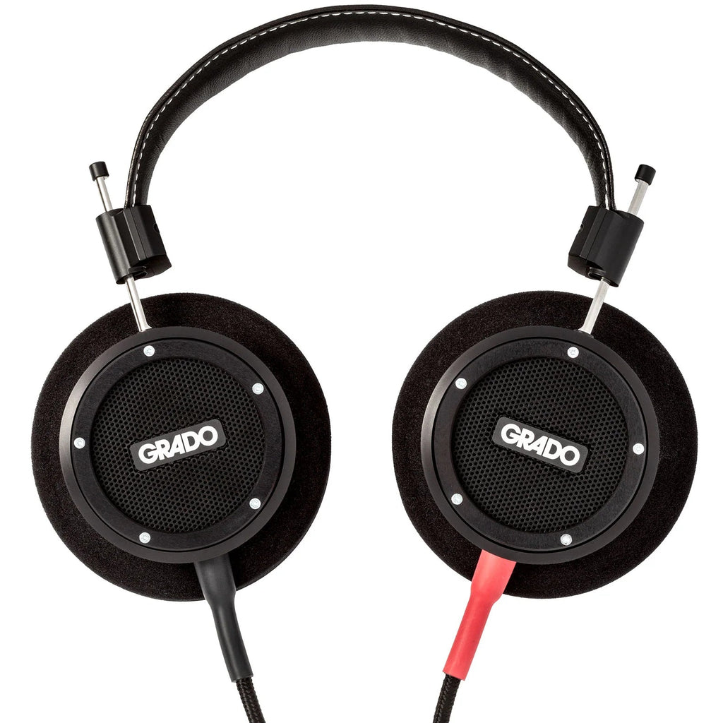 Close-up of Grado Signature S750 wired headphones with sleek design and cushioned ear cups, showcasing high-quality audio craftsmanship.