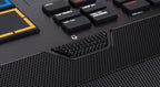 Akai Professional MPC Live III drum machine and sampler with microphone, featuring a sleek control surface and built-in display.