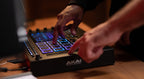 Akai Professional MPC Live III drum machine and sampler with colorful pad controls and touchscreen interface.