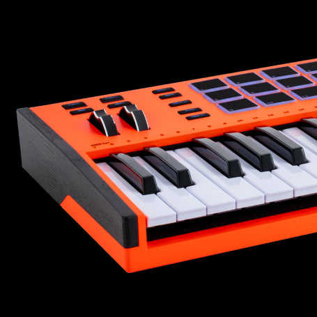 Arturia KeyLab MK3 Ultra orange finish close-up of the dark-stained wooden end panel