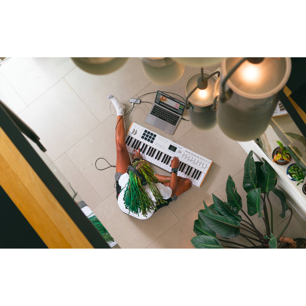 Arturia KeyLab 61 MK3 MIDI keyboard with 61 keys, control knobs, and pads for music production and digital performance.
