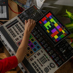 Akai Professional MPC XL drum machine and sampler with large pads, knobs, and display for music production and beat making.