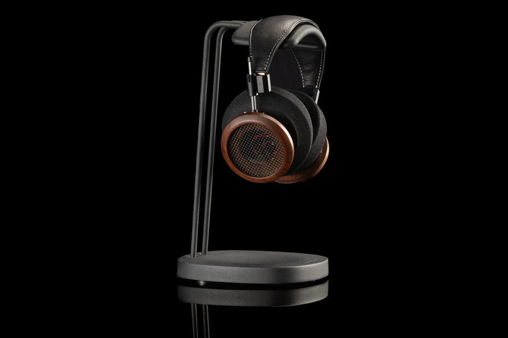 Close-up of Grado Signature S950 wired headphones featuring sleek design and cushioned ear cups, showcasing high-quality audio craftsmanship.