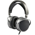 Audeze LCD-S20 closed-back planar studio headphones with over-ear design and sleek black finish, positioned on a surface.