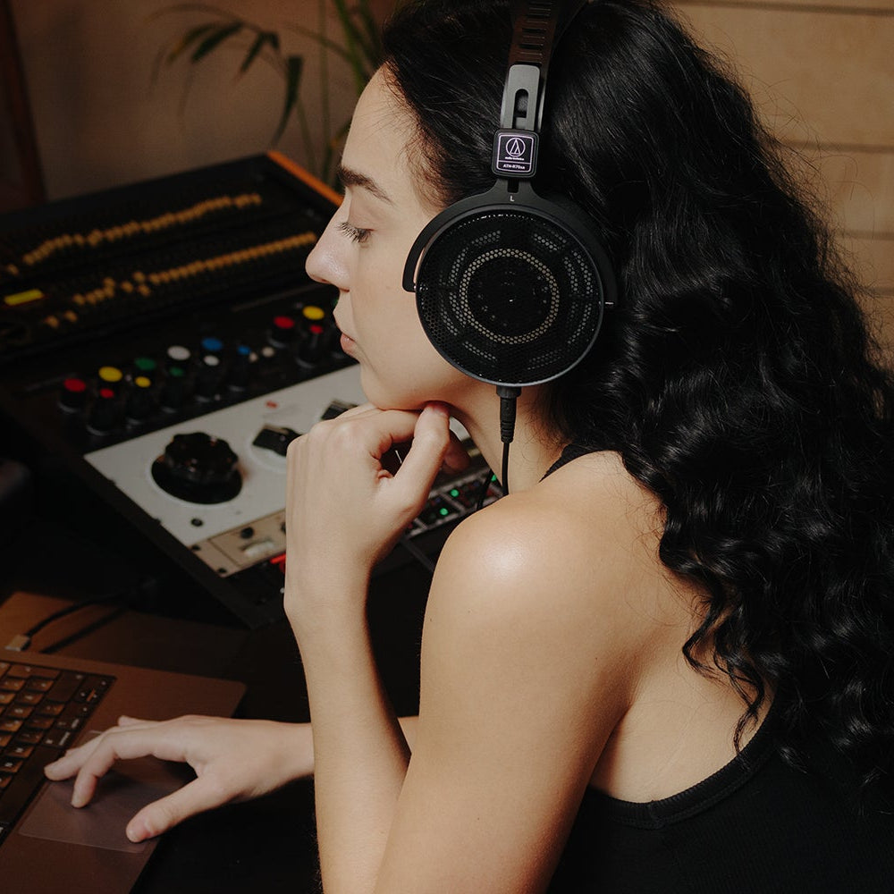 Audio-Technica ATH-R70xa studio headphones, worn by user, lifestyle