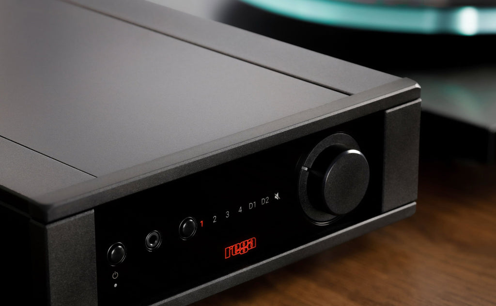 Rega Brio MK7 phono preamp with sleek design and control knobs, showcasing high-quality audio equipment for vinyl playback.