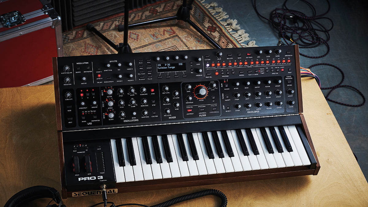 Sequential Pro 3 synthesizer with multiple knobs and controls, displayed on a black background, showcasing its professional interface.