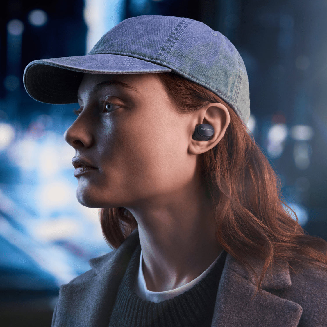 Wireless in-ear headphones by Bowers & Wilkins Pi6 with sleek design and in-ear fit, shown in a close-up image.