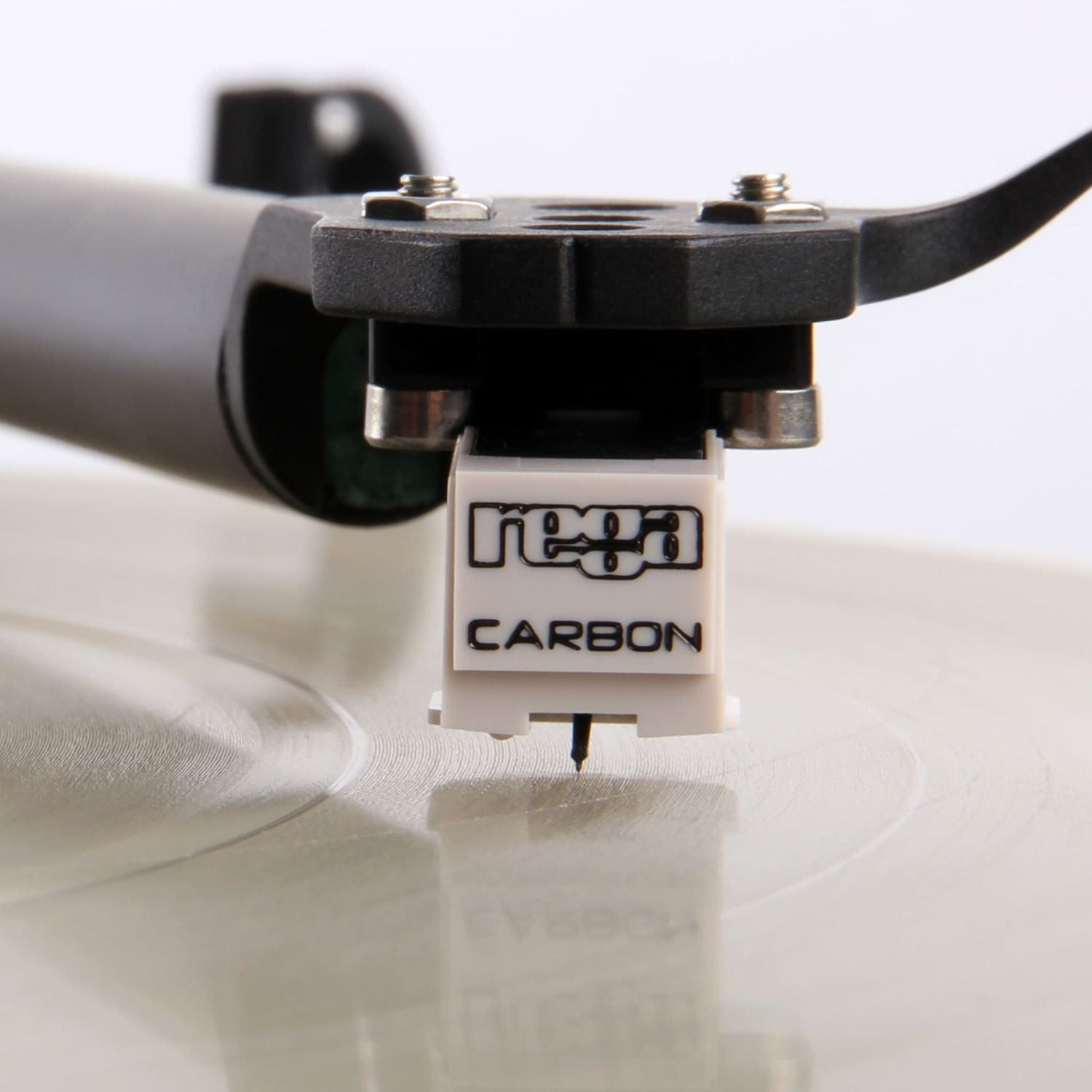Rega Carbon Cartridge for turntables, featuring a sleek black design and detailed stylus for high-quality audio playback.