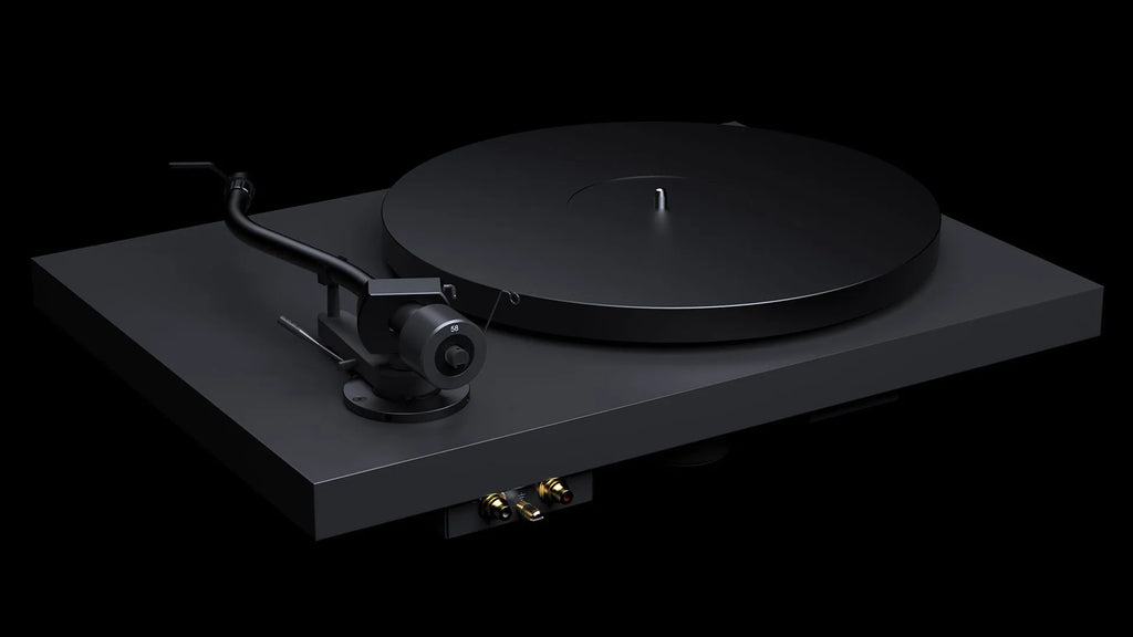Rear view of Pro-Ject Debut Pro S turntable in Satin Black, showcasing its tonearm, platter, and connection ports.